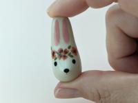 Cute handmade ceramic bunny figurine with flower crown. Small rabbit decor. Small-batch ceramics. Hand-painted pottery.  Easter gift.