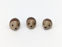 Cute handmade mini ceramic hedgehog figurine. Unique desk buddy. Good luck charm. Small-batch ceramics. Hand-painted pottery.