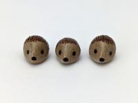 Cute handmade mini ceramic hedgehog figurine. Unique desk buddy. Good luck charm. Small-batch ceramics. Hand-painted pottery.