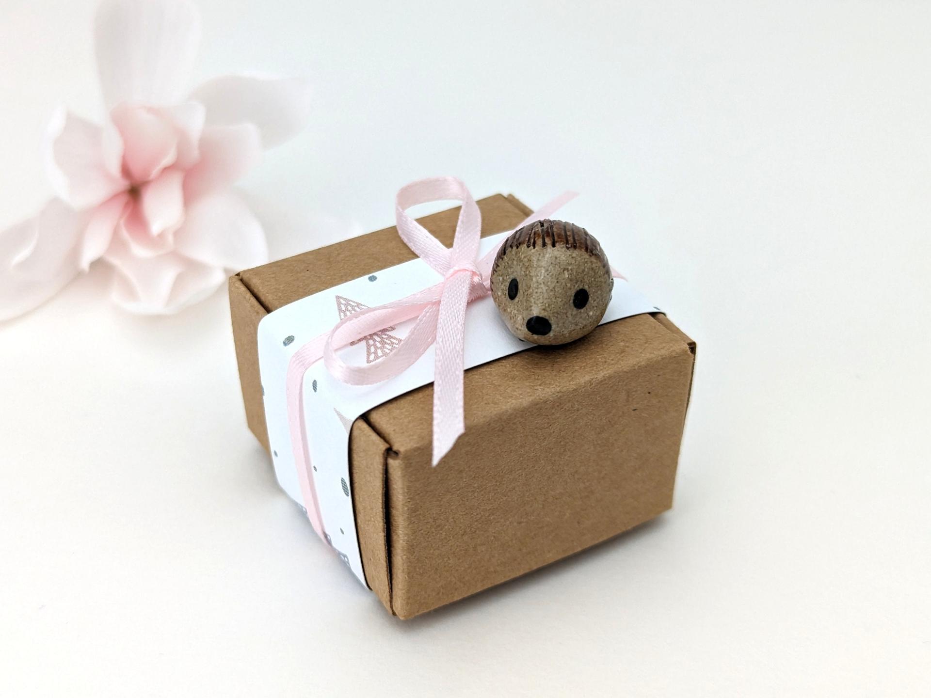 Cute handmade mini ceramic hedgehog figurine. Unique desk buddy. Good luck charm. Small-batch ceramics. Hand-painted pottery.