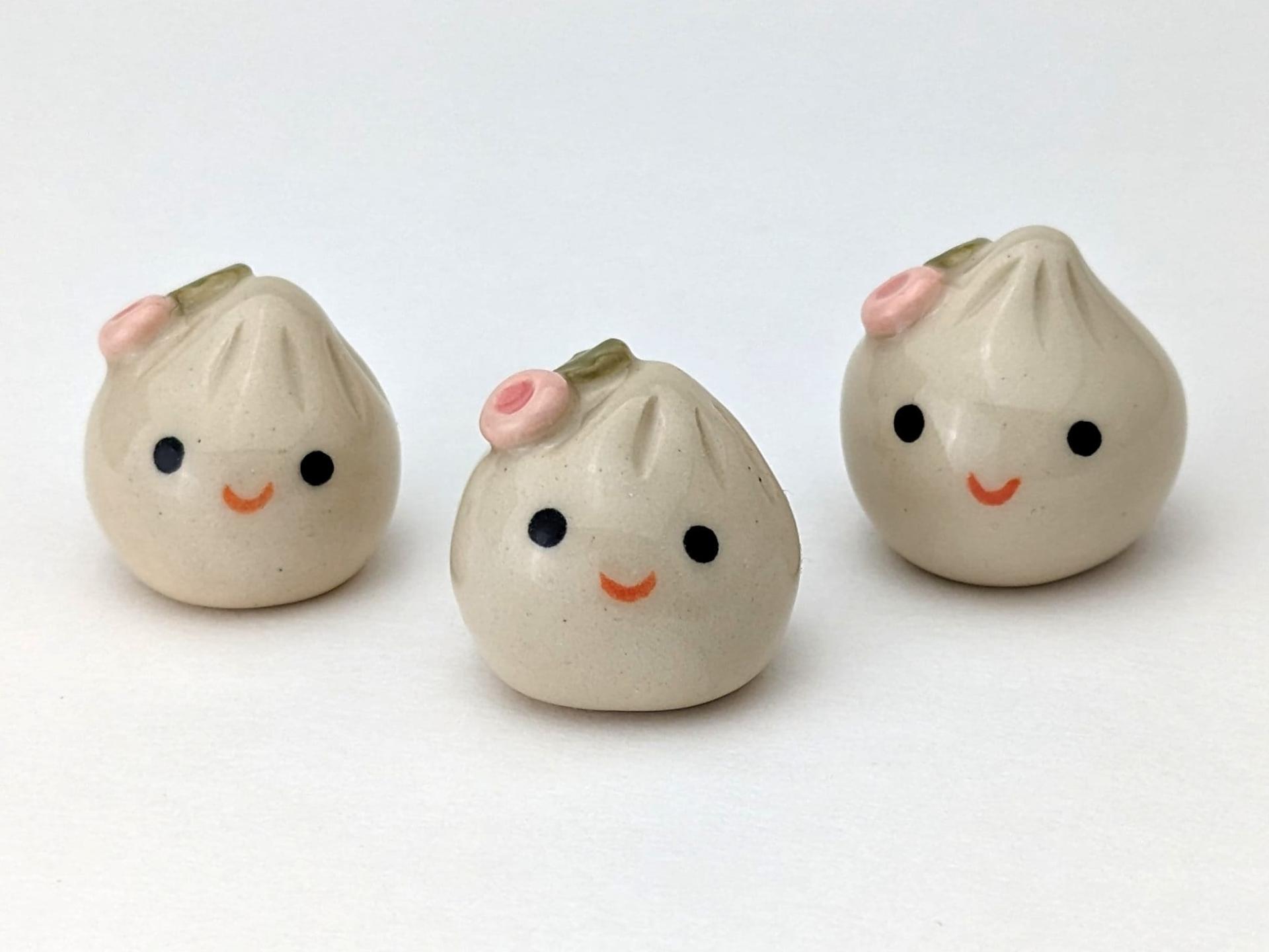 Cute handmade ceramic dumpling with flower. Happy soup dumpling. Adorable gyoza. Xiao long bao. Small-batch ceramics. Hand-painted pottery.