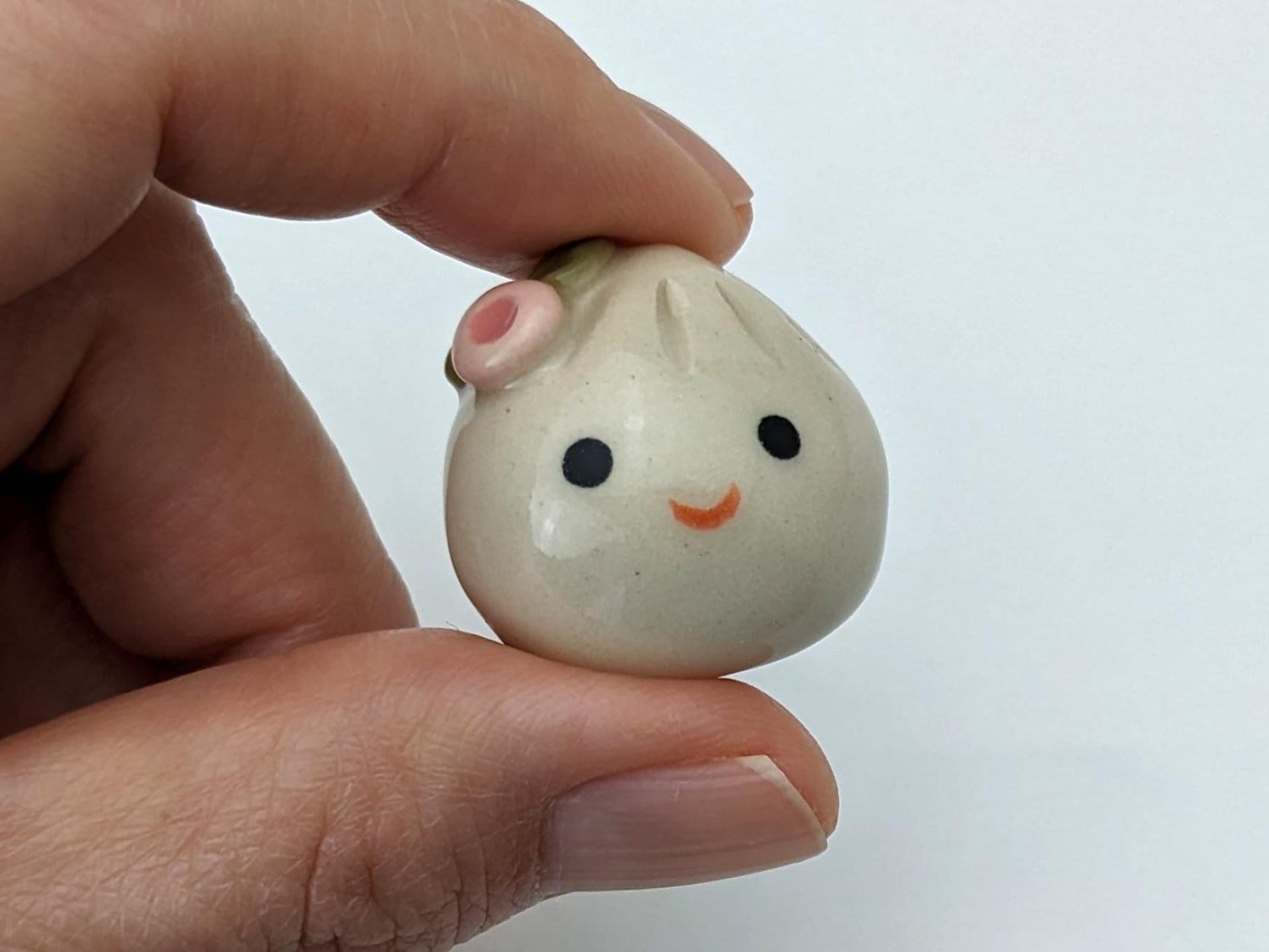 Cute handmade ceramic dumpling with flower. Happy soup dumpling. Adorable gyoza. Xiao long bao. Small-batch ceramics. Hand-painted pottery.