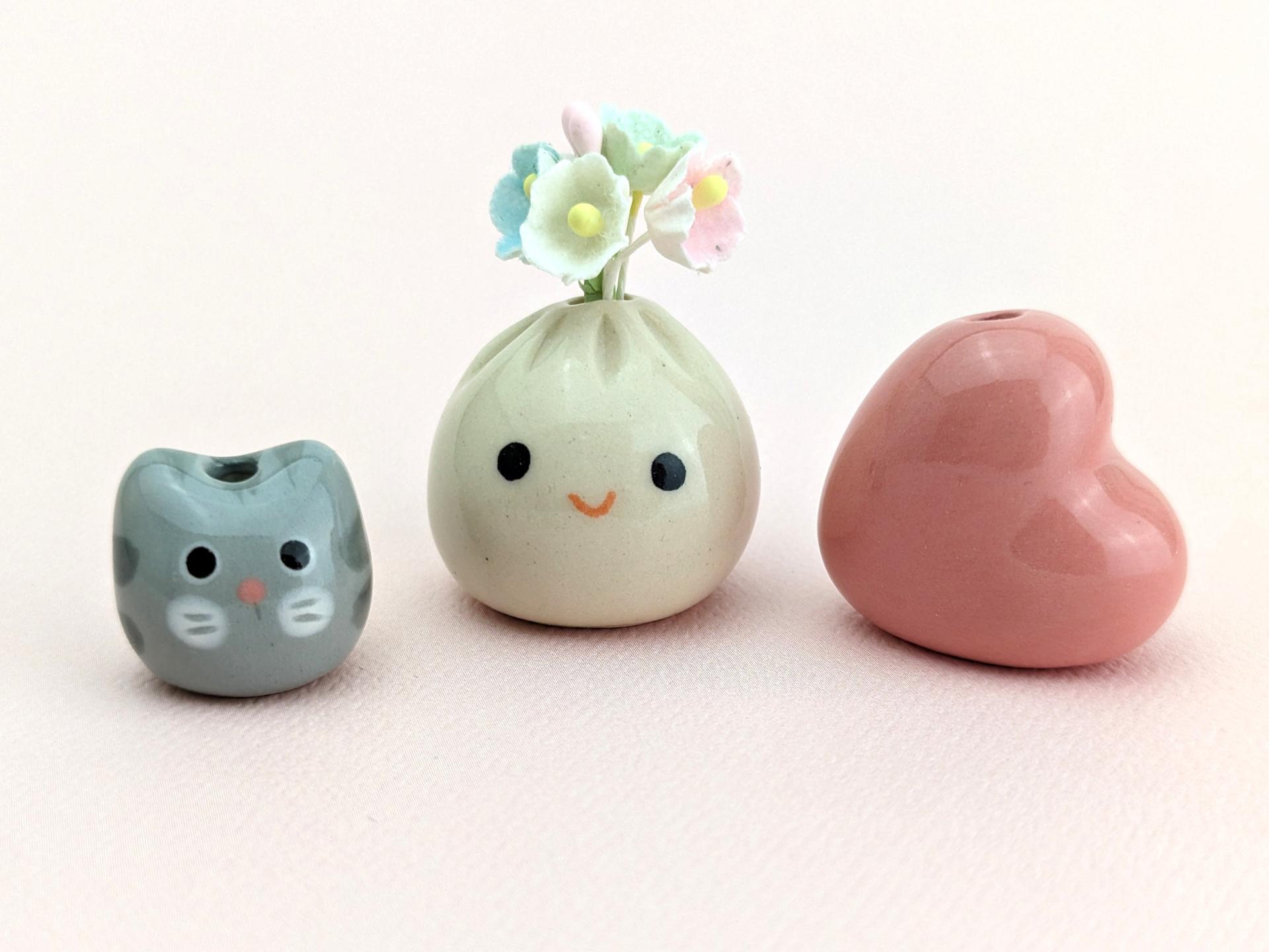 Two cute handmade ceramic dumplings w flowers. Happy soup dumplings. Foodie gift. Xiao long bao. Small-batch ceramics. Hand-painted pottery.