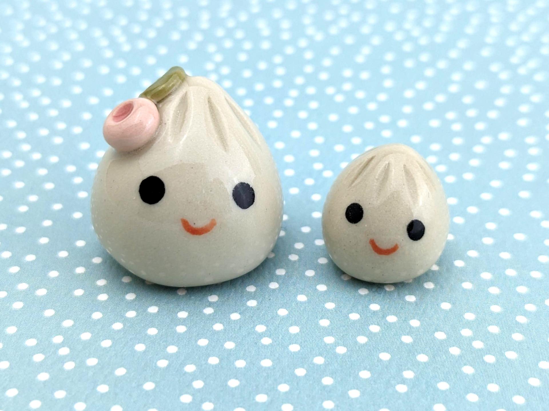 Two cute handmade ceramic dumplings w flowers. Happy soup dumplings. Foodie gift. Xiao long bao. Small-batch ceramics. Hand-painted pottery.